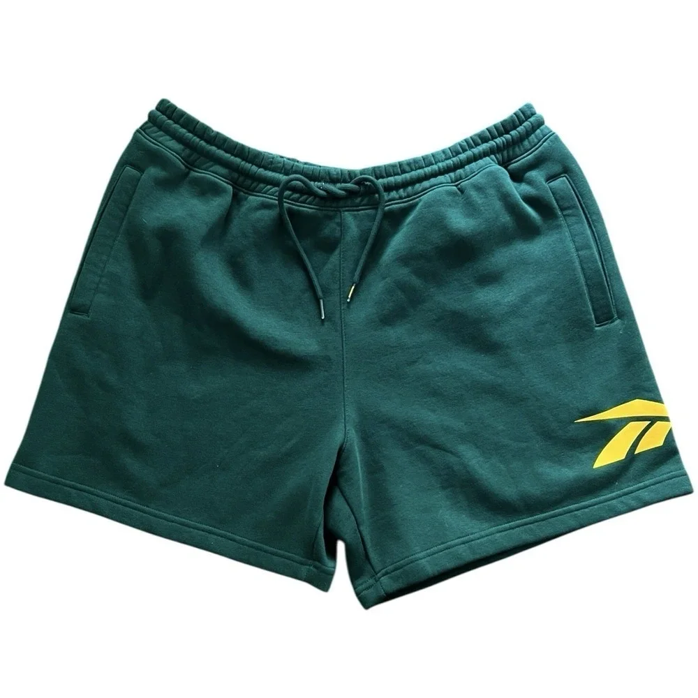 Reebok Green Athletic Shorts with Yellow Logo